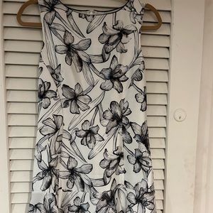 Reiss dress with flower pattern. Flounce skirt.